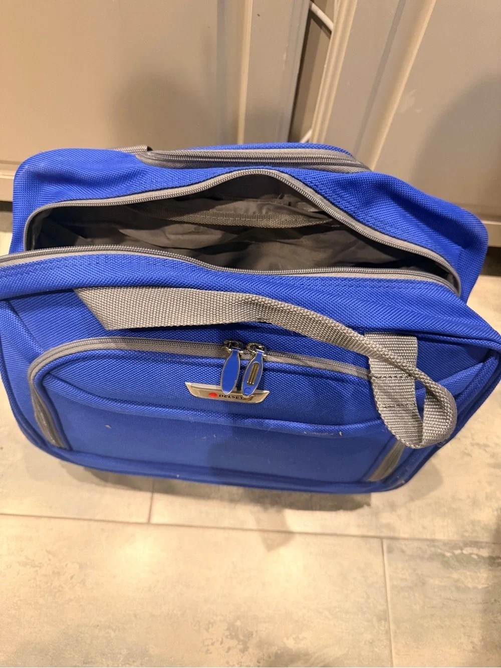 Delsey Underseat Carry On Rolling Tote Blue Softside Travel Bag